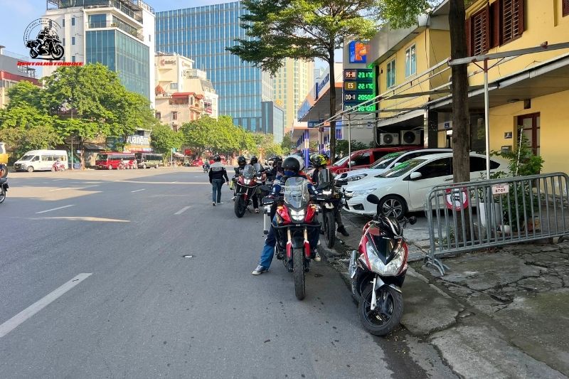 Group of bikers preparing for a motorbike tour on a street in Vietnam