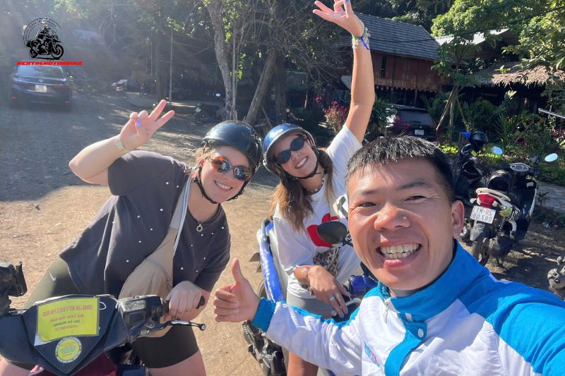 Bikers gathering with motorcycles at a rest stop